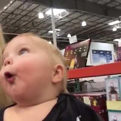 Little kid sees Christmas lights for the first time in his life