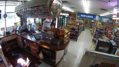 POS casually attempting to light employee on fire during robbery