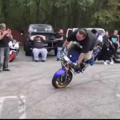 Man executes a perfect stoppie