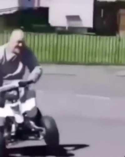 An Elderly Performing A Magic Trick On A 4 Wheeler.