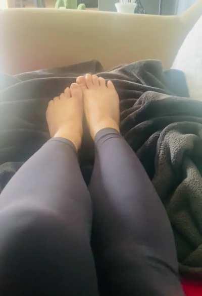 Rubbing my sensual feet around a warm cozy blanket