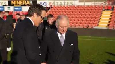 King Charles met the Welsh soccer club Wrexham's Hollywood star owners, Ryan Reynolds and Rob McElhenney