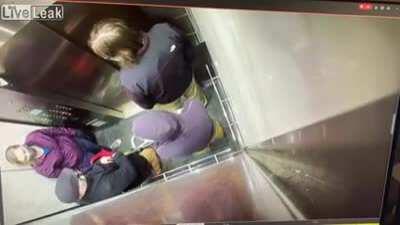 Guy coughs on woman in elevator and gets a good lesson.