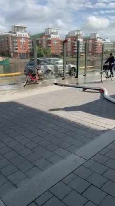 Skater hits hose and continues going forward without his board