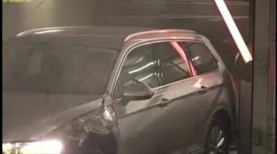 to drive a car into a parking garage