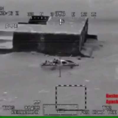 Insurgent fighters in technical get taken out by a hellfire missile. Mid 2000s