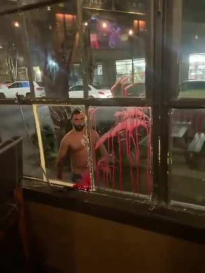 Intoxicated guy punches a glass