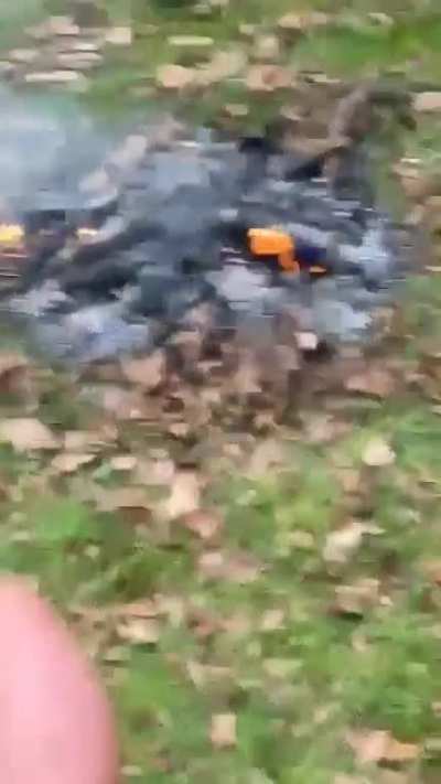 Deodorant can in a campfire