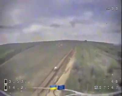 Ukrainian Kamikaze Drone stalks a Russian vehicle. Delivers its payload through the driver side window. Location: Bahkmut