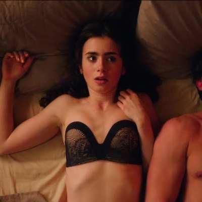 Lily Collins in bed