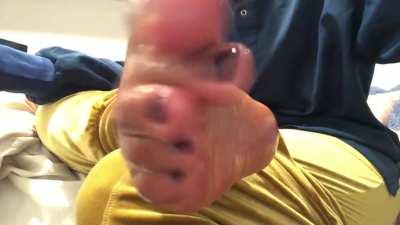 Smushed between my oily toes