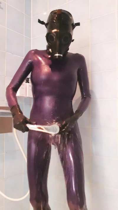 Enjoying a shower in full latex!