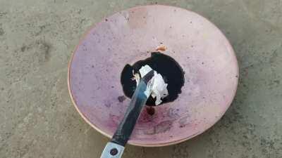 Manganese heptoxide v/s paper