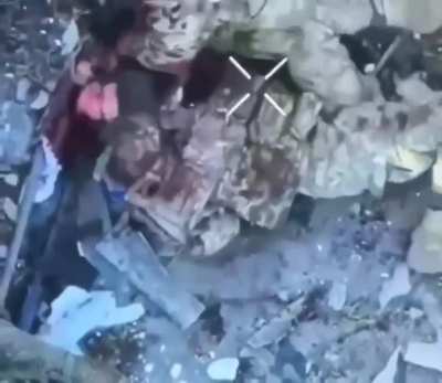 Another angle of the brutal hand-to-hand fight between a Ukrainian and a Russian soldier.