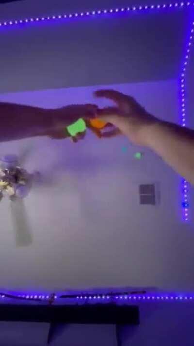 Throwing colorful balls on the celling