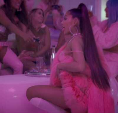 Ari twerking with her tongue out