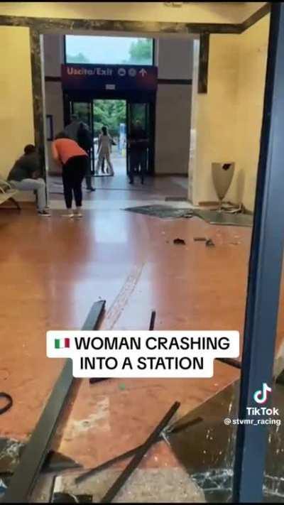 Woman crashing inside a Train station in Italy