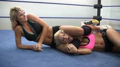 Kristin Astara's pretty head trapped between Amy Love's pretty legs