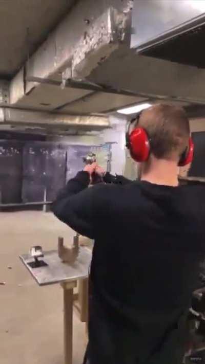Guy almost taps his head with the second shot