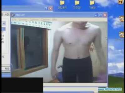 Casually presents broken window.