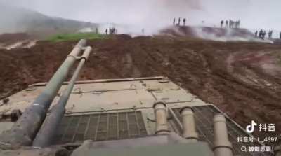 Chinese military observers get blasted by a smoke grenade (they're fine, probably just smelled really bad)