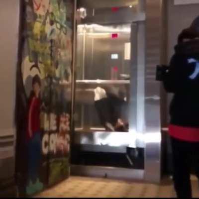 Attempting a backflip in an elevator