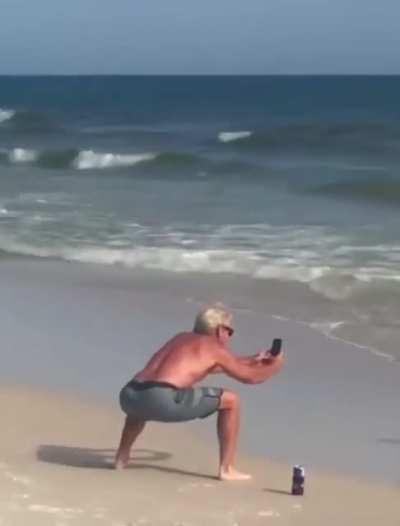 Dads embarrassing their daughters on the beach.