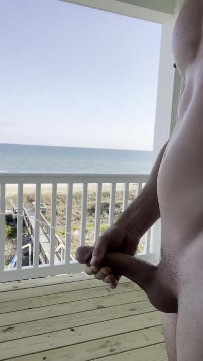 Beach Balcony Massive Cumshot... Would you stop and stare?
