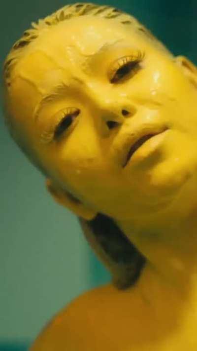 Interesting clip of Bella Poarch covered head to toe in yellow body paint from her upcoming music video