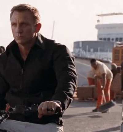 An extra can be seen sweeping away air in the James Bond film 