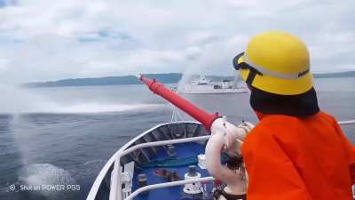 Vietnam and Philippines show off their coast guard's water cannons in a joint firefighting drill