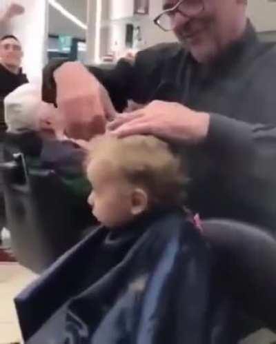 Barbers singing to calm the child down