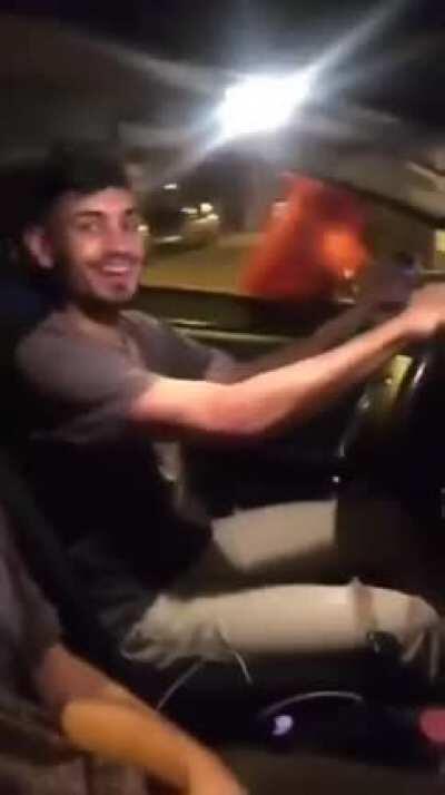 What could possibly happen if I hold my phone outside of my the car's window while I'm in a country that's know for having high rates of crime?