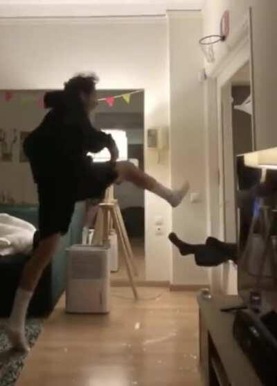 Basketball rim over a glass door