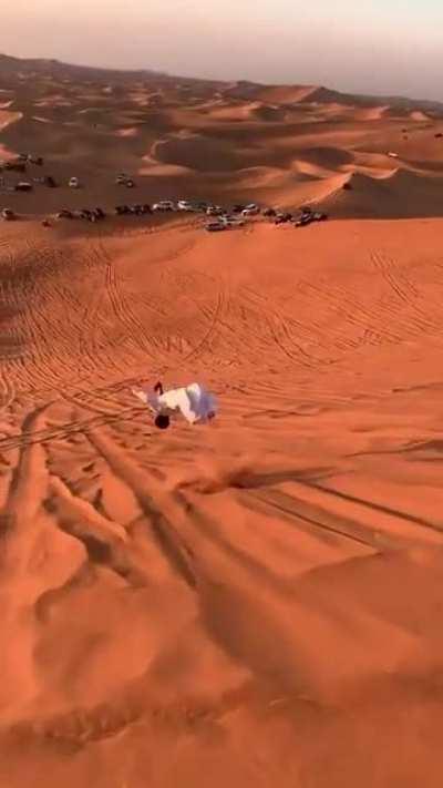 My habibi is backflippin n d desert slope...