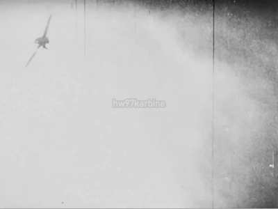 16th Fighter-Interceptor Squadron F-86 Sabre narrowly avoids colliding with a MiG-15 during a dogfight over Korea in June 1953