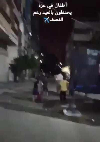 Unreal scene in Gaza minutes ago. Children still celebrating Eid during heavy IDF shelling.