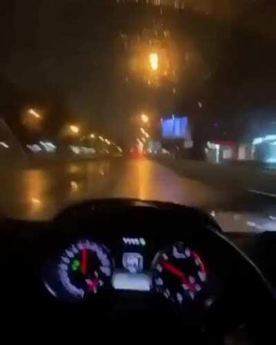 Speeding in the rain while making a video