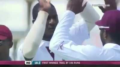 Darren Sammy breaches the wall