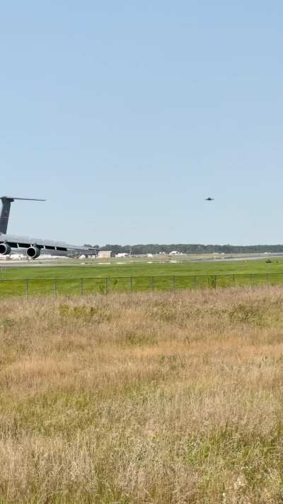 F-16 buzzing a C-5M that just landed 