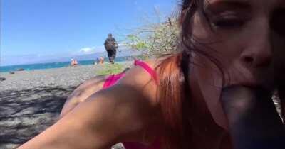 Naughty blowjob on public beach