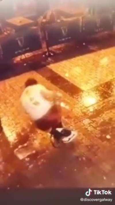 Drunk guy gets into a fight with a pole