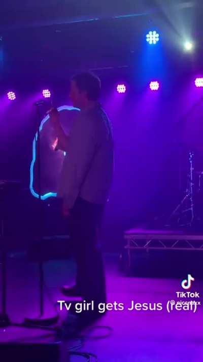 Brad receives a silver crucifix and somehow does not shrivel up and melt on stage