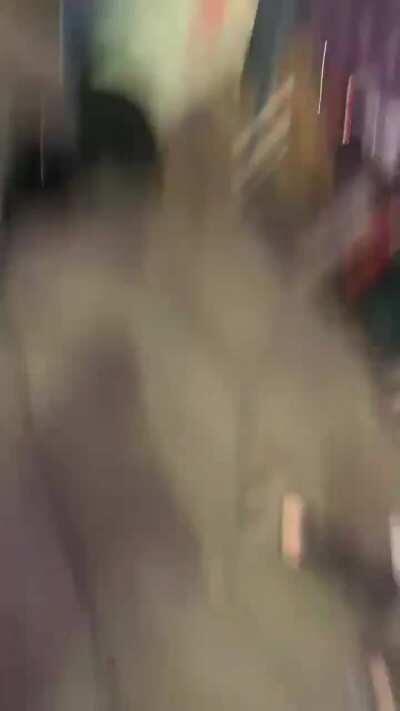 Knicks fans celebrating outside the Garden after reaching .500