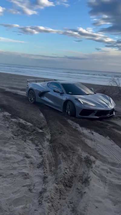 Never take your Corvette to the beach folks!