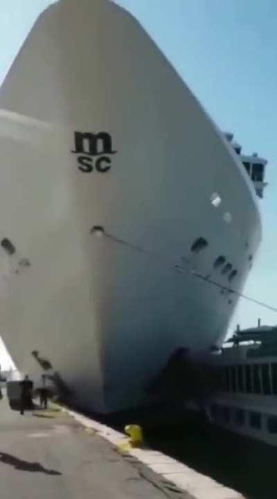 A Cruise ship crashing into a port.