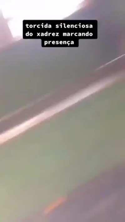 Quiet chess crowd showing up for support