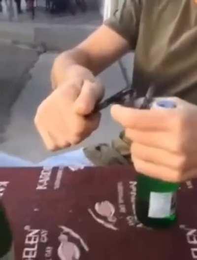 Using your phone to open a beer