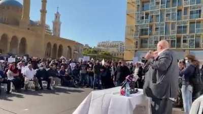 Beirut: One of the anti-vax protest organizers starts coughing, reassures crowd it’s from smoking cigarettes