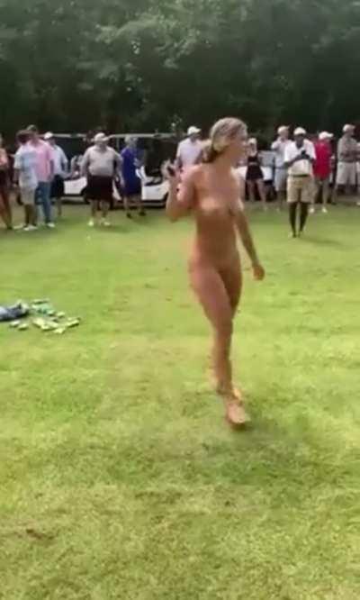 Being naked improves her swing… so she says